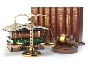 Gold scales of justice, gavel and books with differents field of