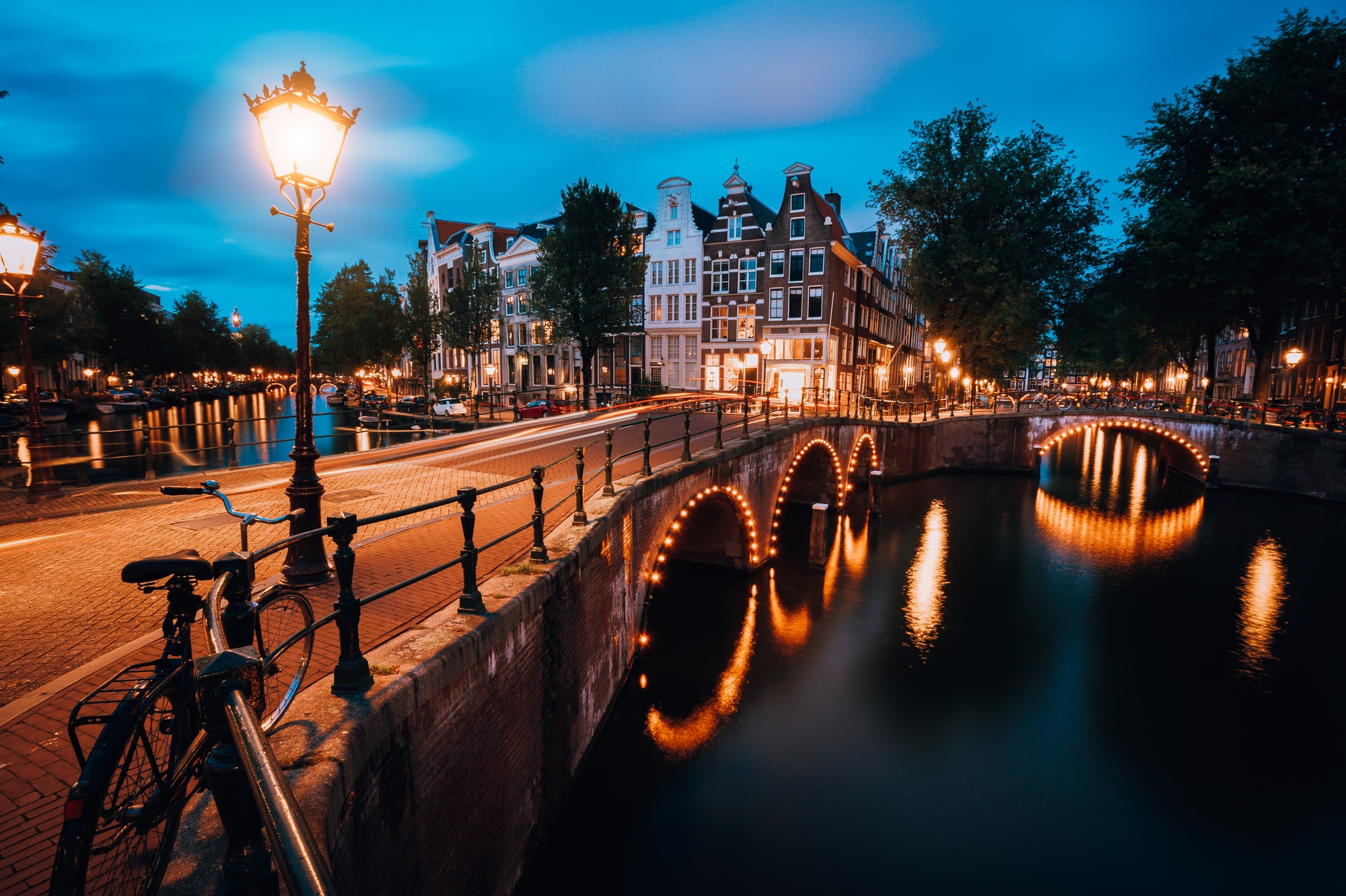 Night cityview of Famous Keizersgracht Emperor's canal in Amsterdam, tranquil scene with street